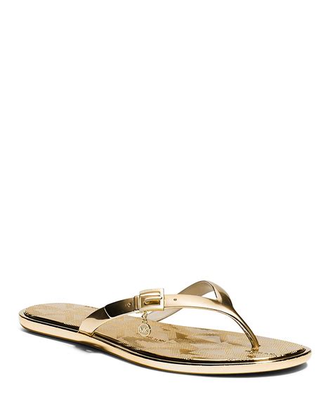 michael kors flip flops black and gold|michael kors gold platform sandals.